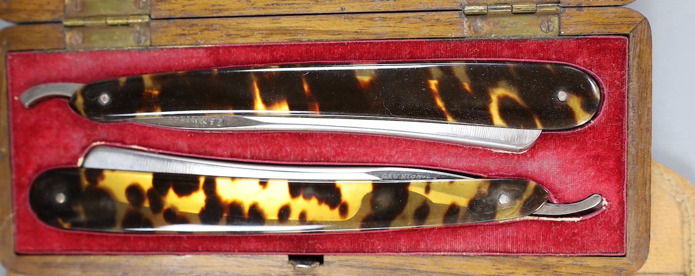 A set of seven tortoiseshell handled cut throat razors for the days of the week Wilkinson and a cased pair of tortoiseshell handled razors, C&W Higginbottom